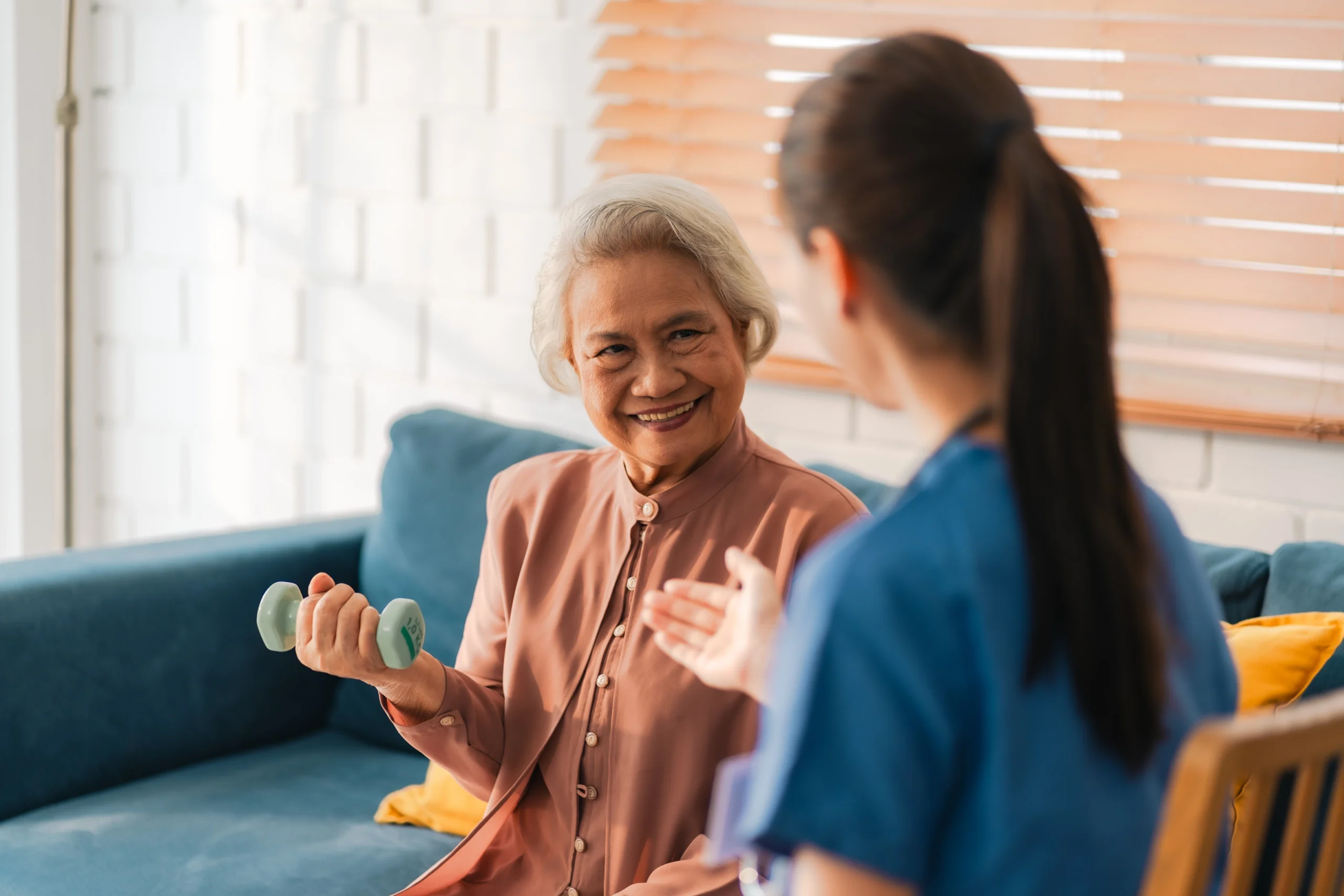 Home Care Capitol Heights MD Asian elderly woman lifting weights