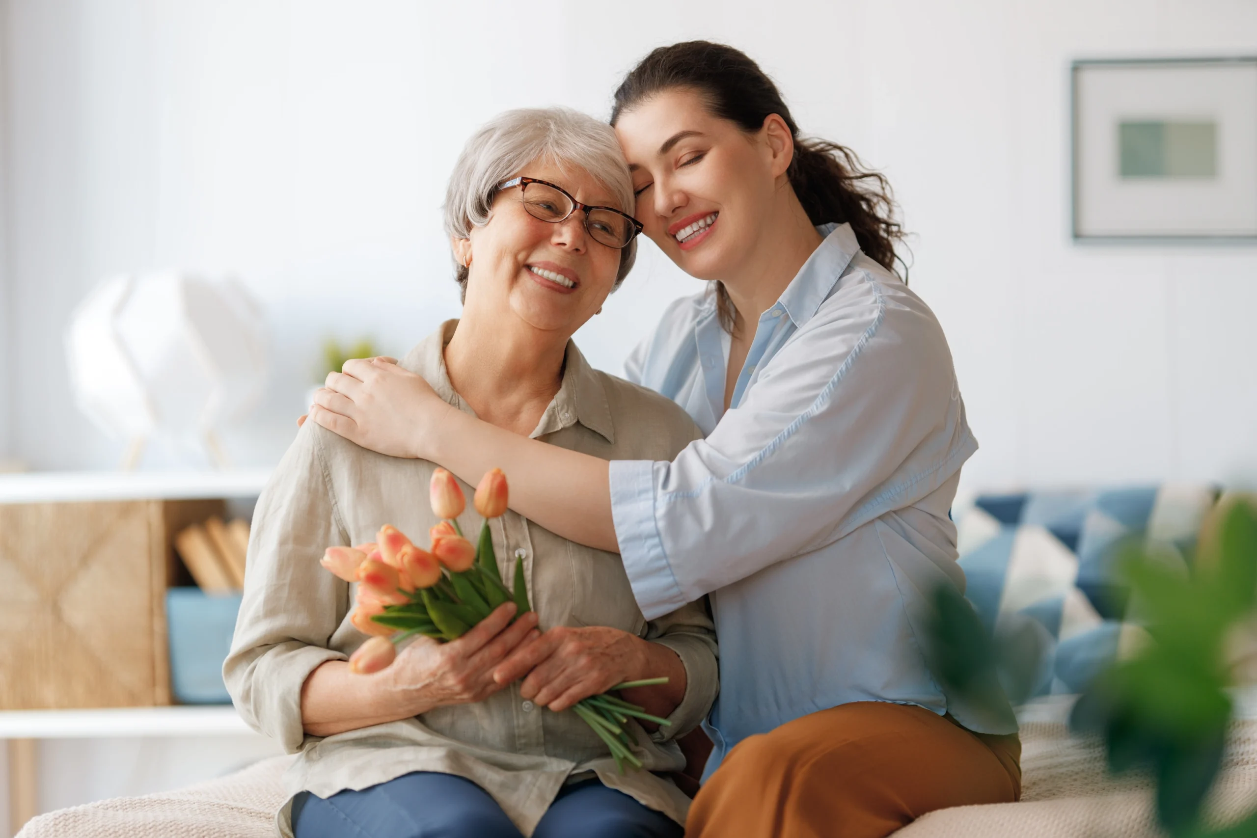 Home Care Seat Pleasant MD caring embrace from caregiver to elderly woman